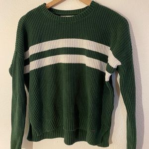 dark green sweater with white stripes